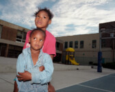 Two girls at basketball tournament at Harold Ikes Homes housing project, Chicago, Illinois, 2000 thumbnail
