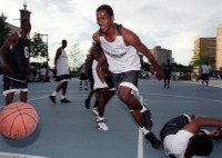 Basketball player in tournament at Harold Ickes Homes housing project, Chicago, Illinois, 2000 thumbnail