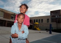 Two girls at basketball tournament at Harold Ikes Homes housing project, Chicago, Illinois, 2000  thumbnail